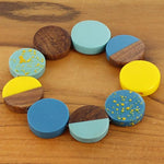 Load image into Gallery viewer, Elasticated Resin and Wood Bracelet - Mustard yellow and blues - Luvit!
